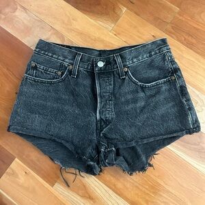 Levi’s 501 black distressed cut off shorts